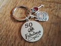 50 and Fabulous Keyring With a Wine Glass and Birthday Cake Charm