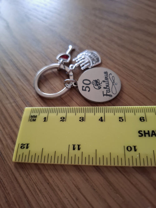 50 and Fabulous Keyring With a Wine Glass and Birthday Cake Charm